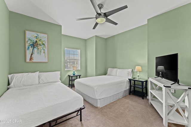carpeted bedroom featuring a ceiling fan