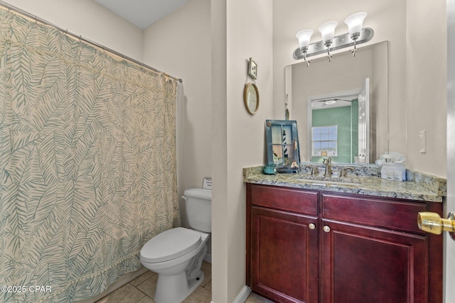full bathroom featuring tile patterned flooring, curtained shower, toilet, and vanity