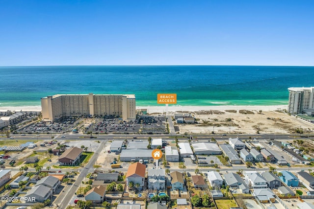 aerial view featuring a view of the beach and a water view