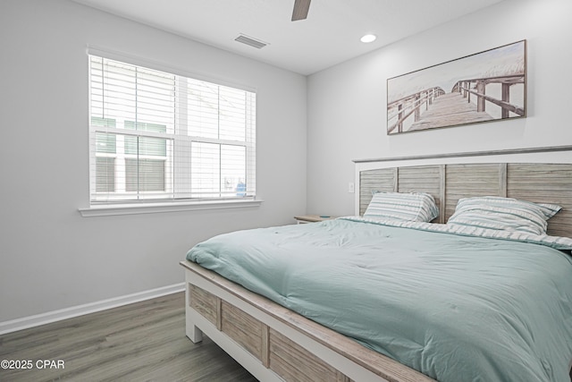 bedroom with visible vents, wood finished floors, baseboards, ceiling fan, and recessed lighting