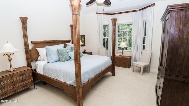 bedroom with light colored carpet