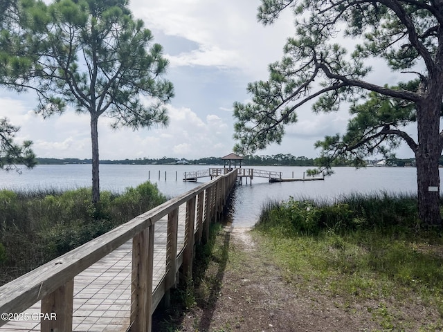 view of dock with a water view