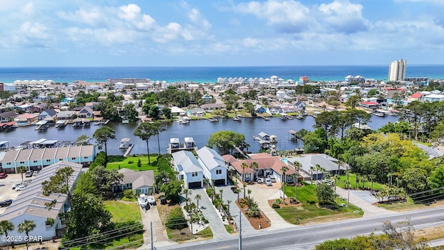 8597 N Lagoon Dr, Panama City, FL 32408 - drone / aerial view with a water view and a residential view