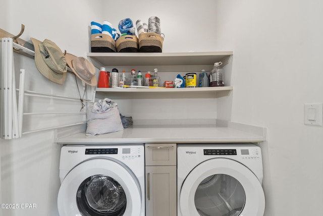 8597 N Lagoon Dr, Panama City, FL 32408 - washroom featuring separate washer and dryer and laundry area