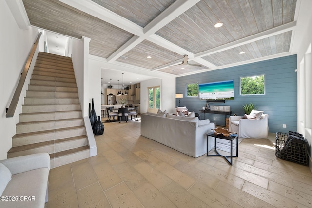 8597 N Lagoon Dr, Panama City, FL 32408 - living room with wood ceiling, stairway, beamed ceiling, and recessed lighting