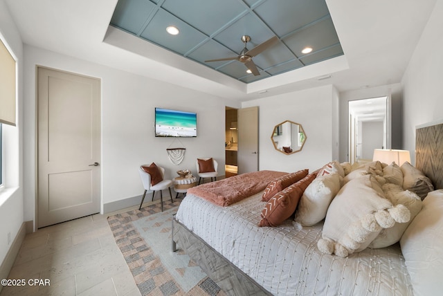 8597 N Lagoon Dr, Panama City, FL 32408 - bedroom featuring a ceiling fan, baseboards, a raised ceiling, and recessed lighting