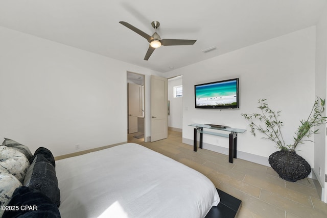 8597 N Lagoon Dr, Panama City, FL 32408 - bedroom with baseboards, ceiling fan, and visible vents