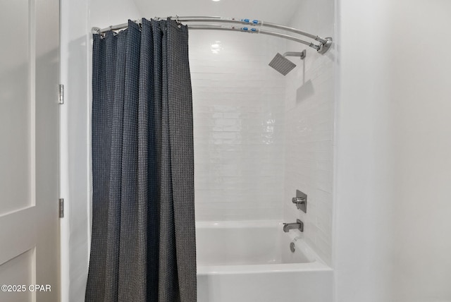 8597 N Lagoon Dr, Panama City, FL 32408 - bathroom featuring shower / bath combo with shower curtain