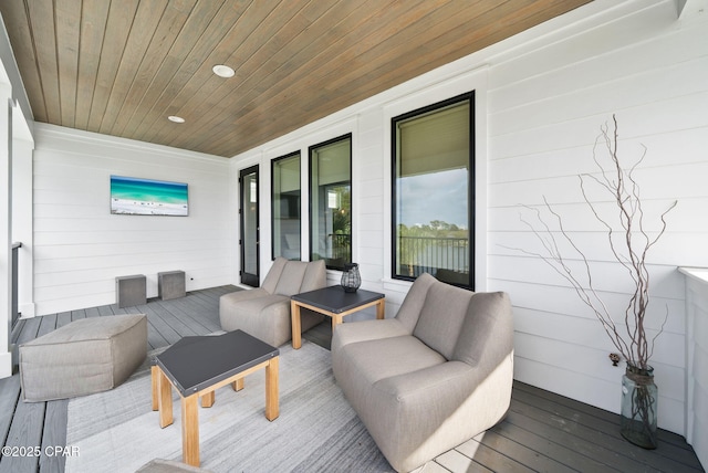 8597 N Lagoon Dr, Panama City, FL 32408 - wooden terrace with outdoor lounge area