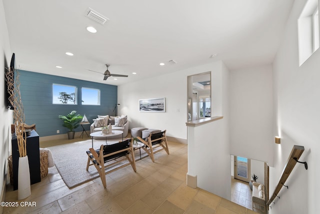 8597 N Lagoon Dr, Panama City, FL 32408 - living room featuring a wealth of natural light, visible vents, a ceiling fan, and recessed lighting
