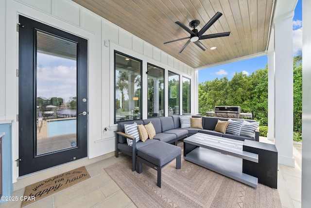 8597 N Lagoon Dr, Panama City, FL 32408 - view of patio featuring an outdoor hangout area, area for grilling, a grill, and a ceiling fan