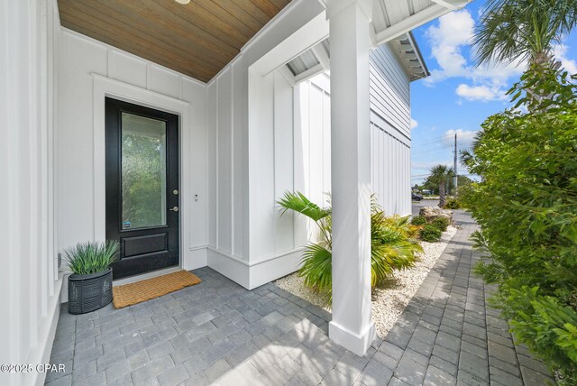 8597 N Lagoon Dr, Panama City, FL 32408 - entrance to property with board and batten siding