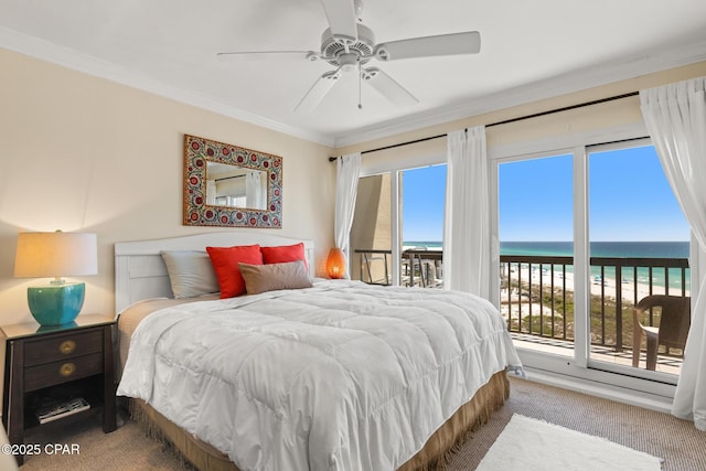 carpeted bedroom featuring ornamental molding, a beach view, access to outside, a water view, and a ceiling fan