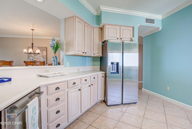 8601 Surf Dr Unit 14E, Panama City, FL 32408 - kitchen with a notable chandelier, visible vents, ornamental molding, and stainless steel fridge with ice dispenser