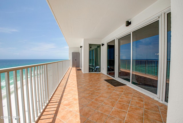 8601 Surf Dr Unit 14E, Panama City, FL 32408 - balcony with a water view and a beach view