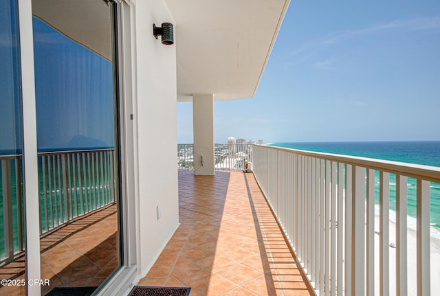 8601 Surf Dr Unit 14E, Panama City, FL 32408 - balcony with a beach view and a water view