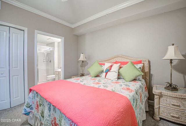 8601 Surf Dr Unit 14E, Panama City, FL 32408 - carpeted bedroom featuring ornamental molding, a closet, and ensuite bath