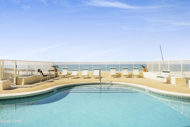 8601 Surf Dr Unit 14E, Panama City, FL 32408 - pool featuring fence and a patio area