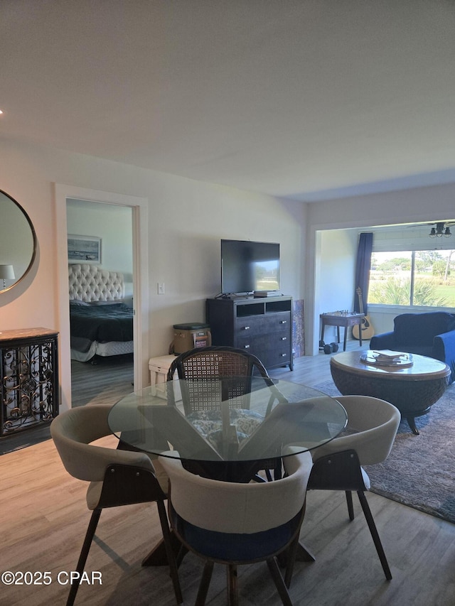 4725 Bay Point Rd Unit 262, Panama City Beach, FL 32408 - dining area featuring wood finished floors