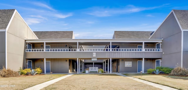 4725 Bay Point Rd Unit 262, Panama City Beach, FL 32408 - exterior space featuring a shingled roof and a balcony