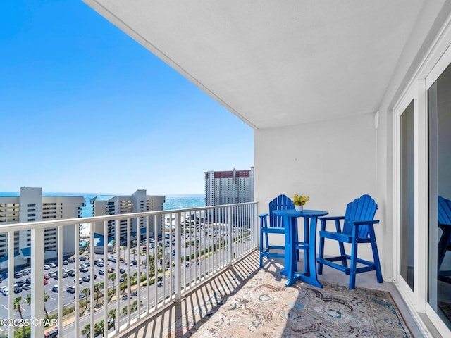 9860 S Thomas Dr Unit 1202, Panama City Beach, FL 32408 - balcony featuring a water view and a city view