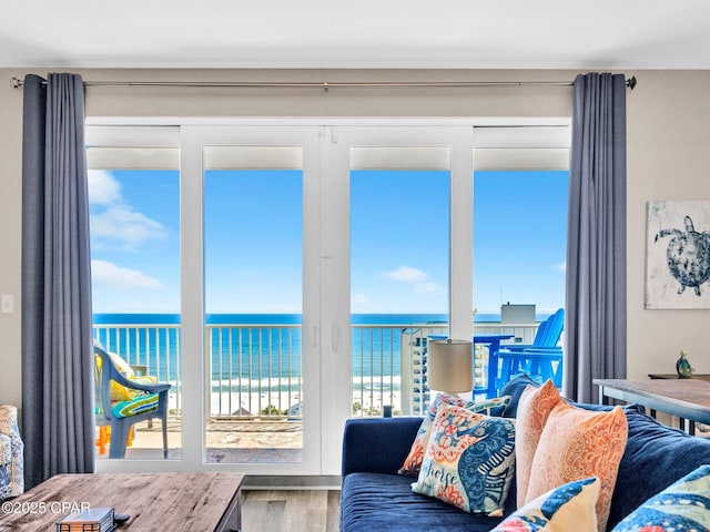 9860 S Thomas Dr Unit 1202, Panama City Beach, FL 32408 - living room with wood finished floors and a water view