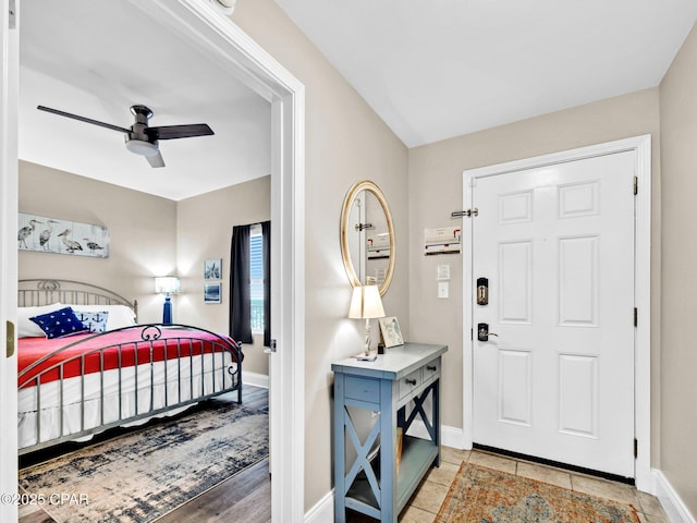 9860 S Thomas Dr Unit 1202, Panama City Beach, FL 32408 - entrance foyer with a ceiling fan and baseboards