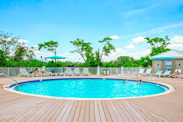 9860 S Thomas Dr Unit 1202, Panama City Beach, FL 32408 - community pool featuring fence and a deck