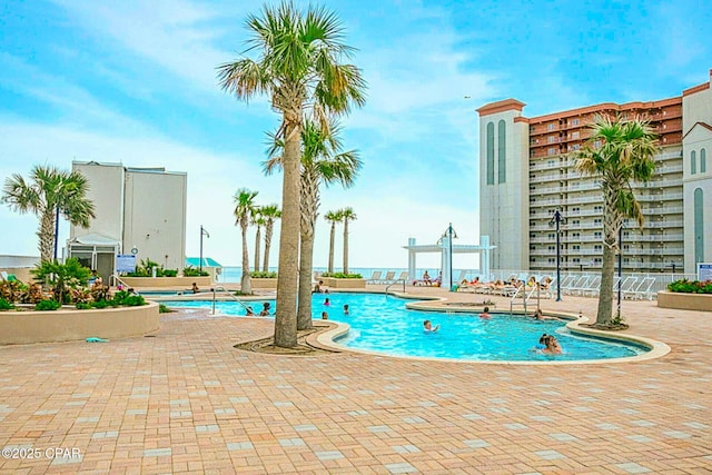 9860 S Thomas Dr Unit 1202, Panama City Beach, FL 32408 - community pool with a patio