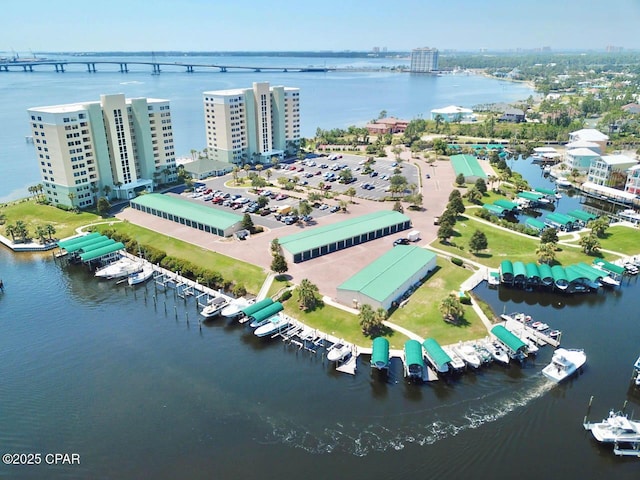 drone / aerial view of a large body of water and a notable bridge