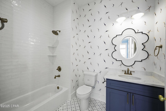 full bathroom with vanity, baseboards, shower / bath combination, and toilet