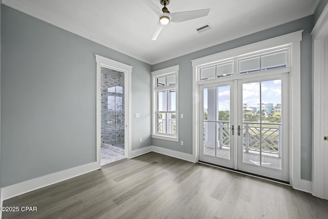 doorway to outside with ceiling fan, french doors, baseboards, wood finished floors, and visible vents