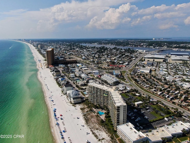 bird's eye view featuring a view of the beach and a water view