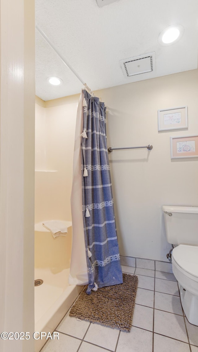 bathroom with toilet, tile patterned floors, recessed lighting, a shower stall, and visible vents
