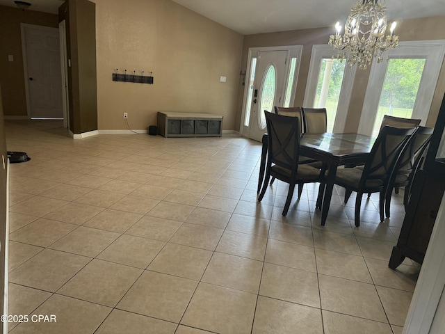 21022 Sweetwater Branch Rd, Fountain, FL 32438 - dining room featuring a chandelier and light tile patterned flooring