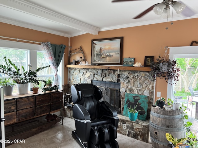 3906 W 24th Ct, Panama City, FL 32405 - living area featuring a stone fireplace, crown molding, ceiling fan, and a wealth of natural light