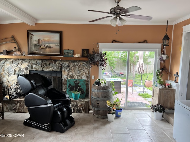 3906 W 24th Ct, Panama City, FL 32405 - living room with tile patterned flooring, ornamental molding, a ceiling fan, and a fireplace