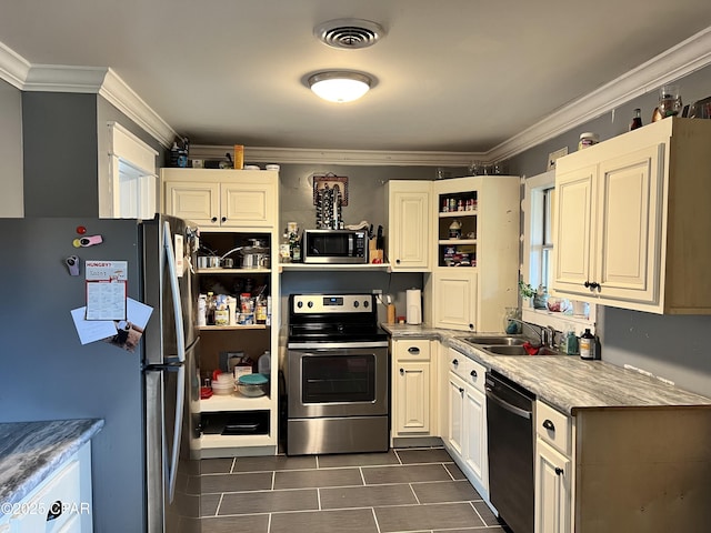 3906 W 24th Ct, Panama City, FL 32405 - kitchen with ornamental molding, open shelves, stainless steel appliances, and visible vents