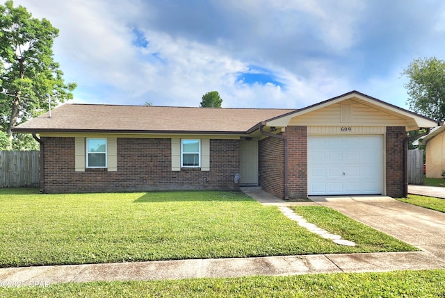 609 E Pine Forest Dr, Lynn Haven, FL 32444 - ranch-style house featuring brick siding, fence, a front lawn, concrete driveway, and an attached garage