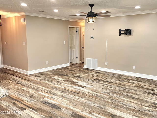 609 E Pine Forest Dr, Lynn Haven, FL 32444 - spare room featuring visible vents, a ceiling fan, and wood finished floors
