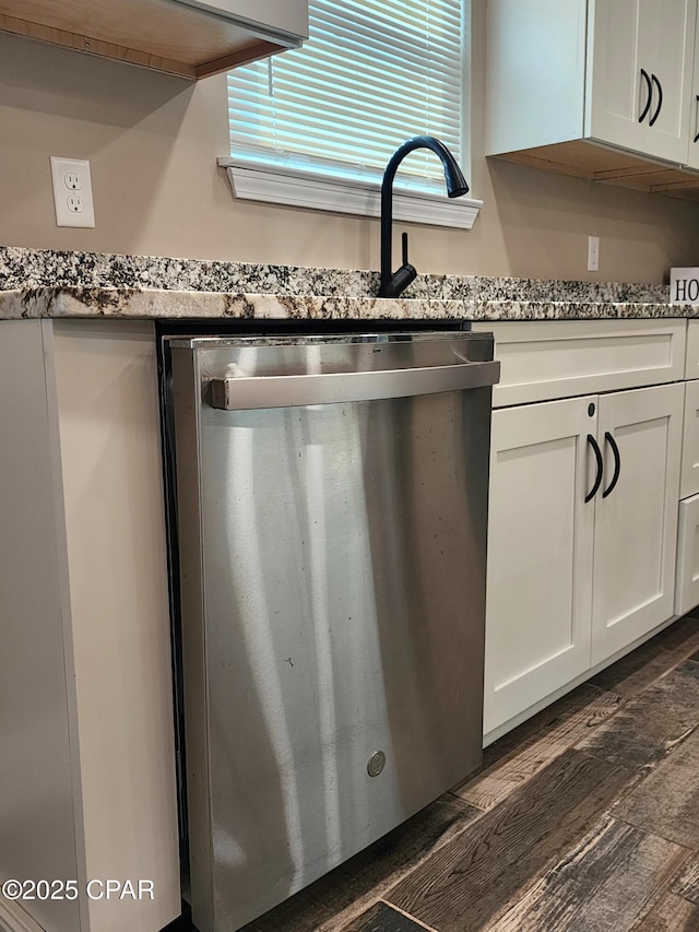 609 E Pine Forest Dr, Lynn Haven, FL 32444 - interior details featuring white cabinets, light stone counters, dark wood-type flooring, and dishwasher