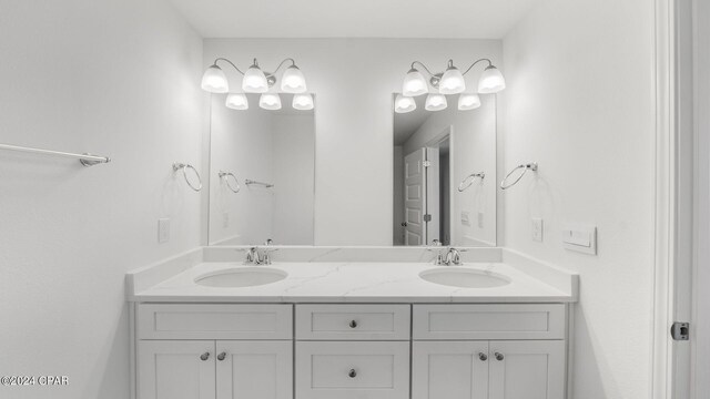 268 Salt Creek Ln, Mexico Beach, FL 32456 - bathroom featuring double vanity