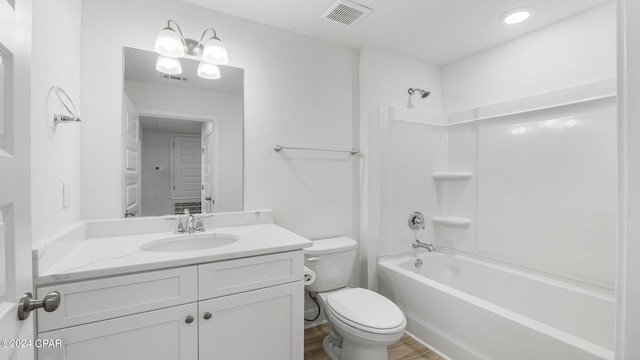 268 Salt Creek Ln, Mexico Beach, FL 32456 - full bathroom with toilet, vanity, washtub / shower combination, and wood finished floors