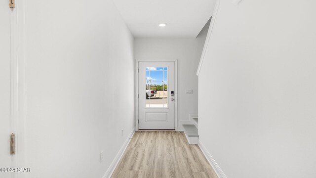 268 Salt Creek Ln, Mexico Beach, FL 32456 - hallway with light wood-type flooring and baseboards