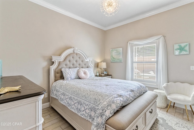 bedroom with baseboards, ornamental molding, and light wood-style floors