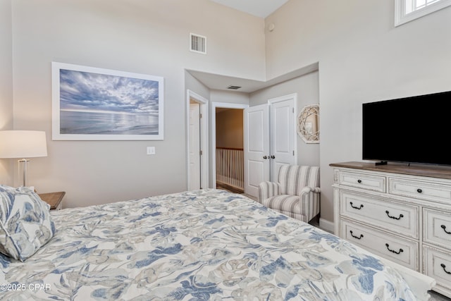 bedroom featuring a closet and visible vents