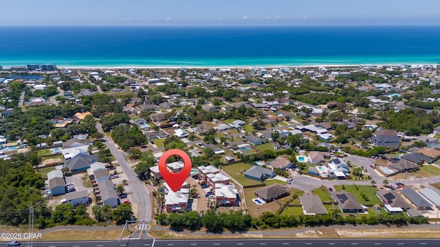 birds eye view of property featuring a water view and a residential view