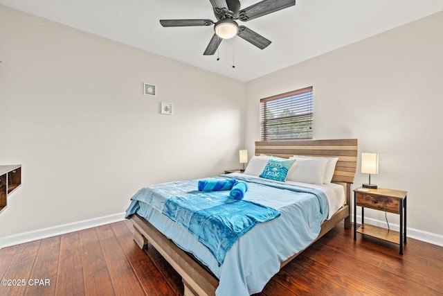 4025 Venus St, Panama City Beach, FL 32408 - bedroom featuring baseboards, wood-type flooring, and a ceiling fan