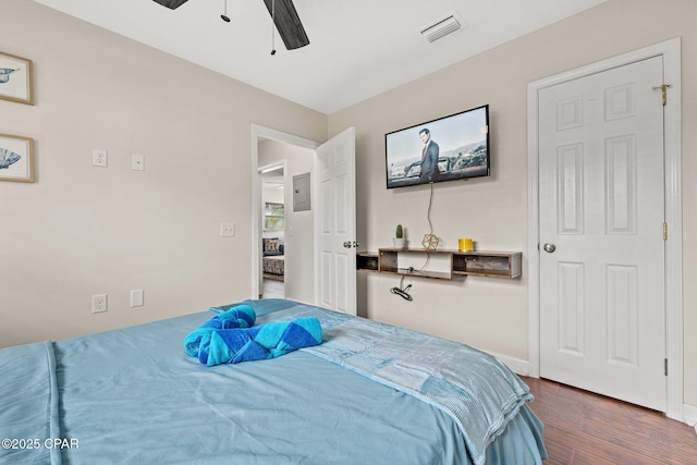4025 Venus St, Panama City Beach, FL 32408 - bedroom featuring ceiling fan, visible vents, and wood finished floors