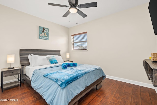 4025 Venus St, Panama City Beach, FL 32408 - bedroom featuring hardwood / wood-style flooring, baseboards, and a ceiling fan